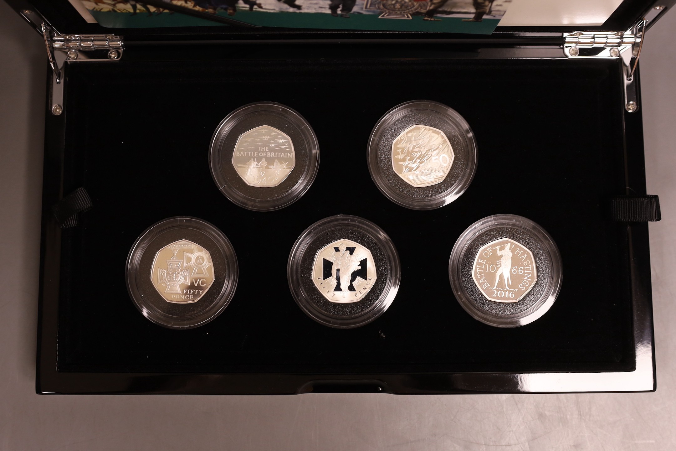 UK Royal Mint commemorative silver proof five 50p coin set, 'Celebrating 50 years of the 50p British Military set', limited edition number 137 of 1969, cased with certificate